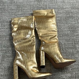 Gold leather boots.